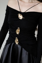 Nadine off-shoulder panelled maxi dress in Black